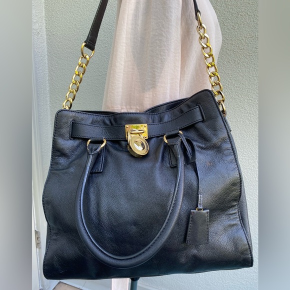 Michael Kors Handbags - Michael Kors Black Leather Shoulder Bag with Gold Tone Accents